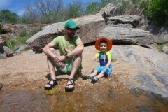 Throwing rocks at Devil's Waterhole